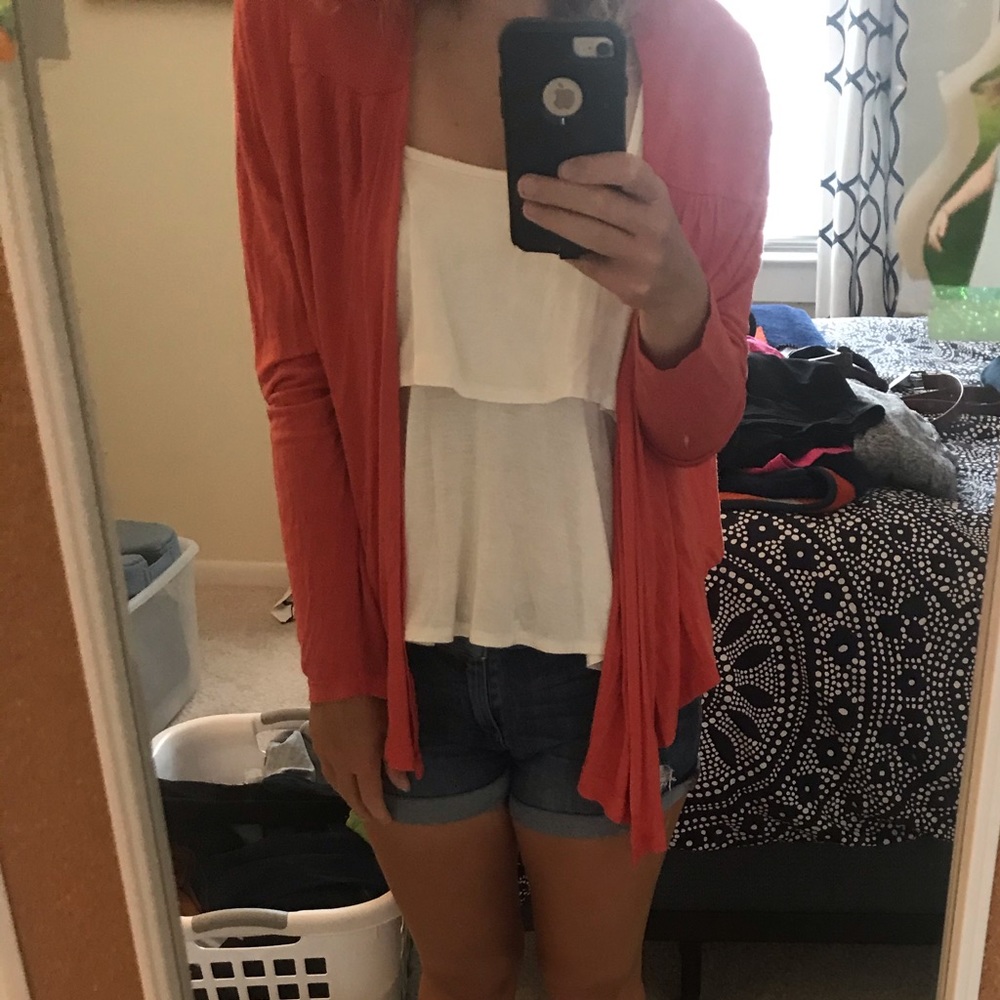 Bright orange open cardigan